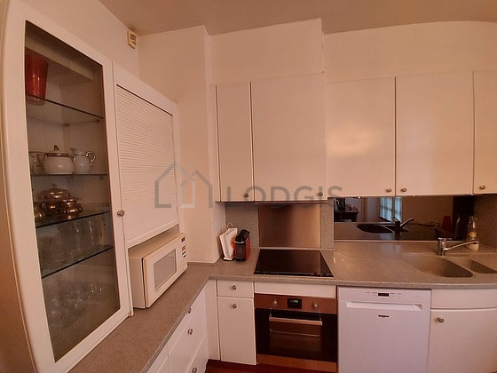 Kitchen equipped with dishwasher, hob, refrigerator, freezer
