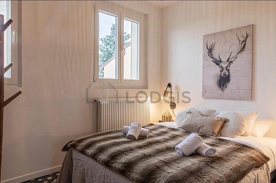 Bedroom with wooden floor