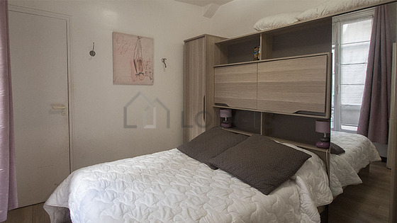 Bedroom with wooden floor