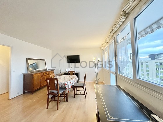 Living room furnished with 1 sofabed(s) of 140cm, tv, closet, 4 chair(s)