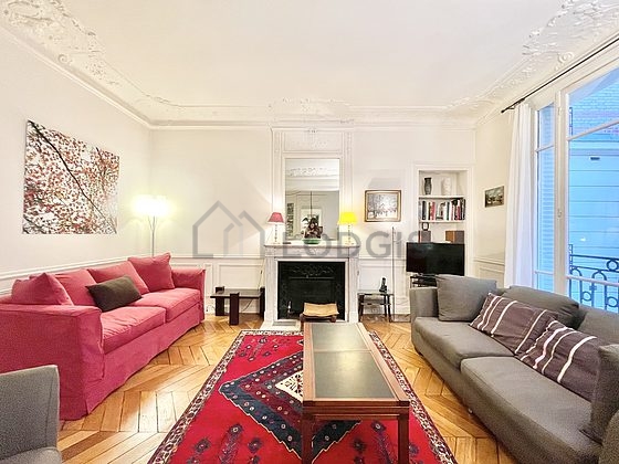 Living room furnished with tv, 1 armchair(s)