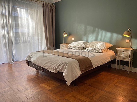 Bedroom with wooden floor