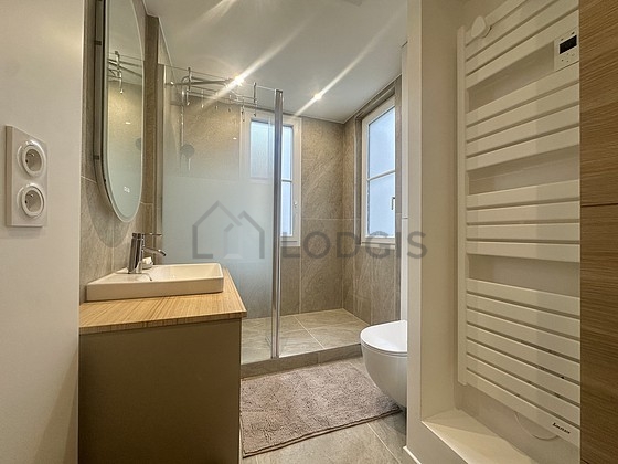 Bathroom equipped with washing machine, dryer