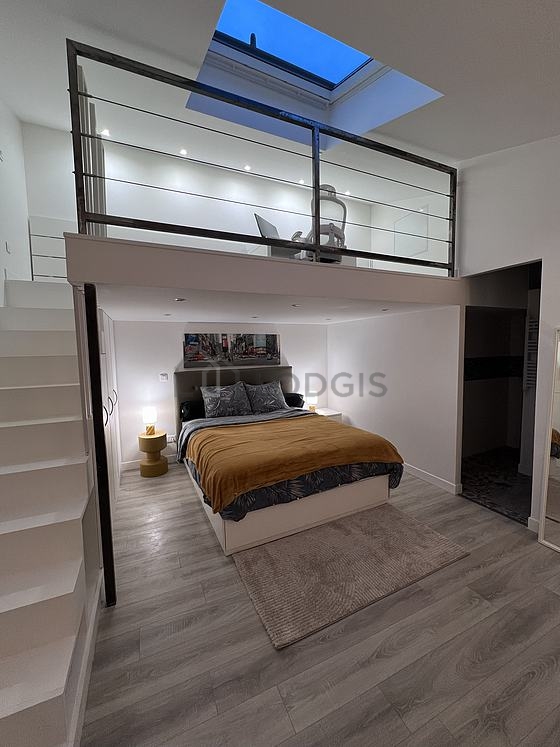 Bedroom with wooden floor