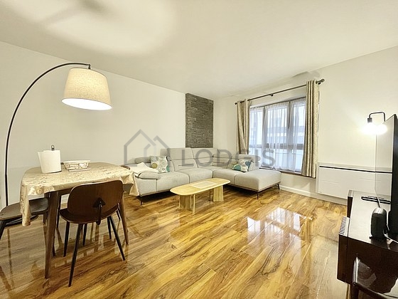 Living room furnished with tv, storage space, 1 chair(s)