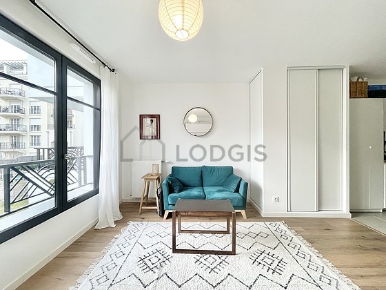 Very quiet living room furnished with 1 murphy bed(s) of 140cm, tv, 1 armchair(s), 2 chair(s)