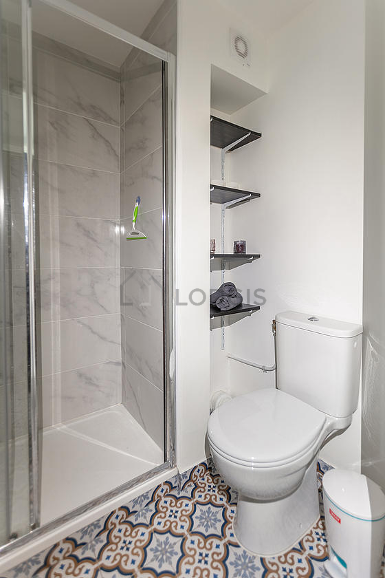 Bathroom equipped with shelves