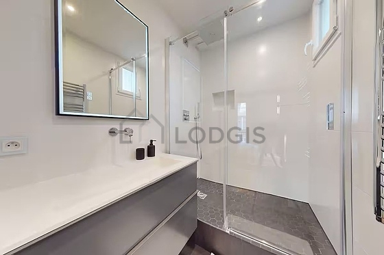 Pleasant and very bright bathroom with tile floor