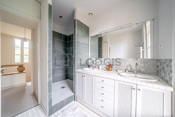 Bathroom equipped with bath tub, separate shower