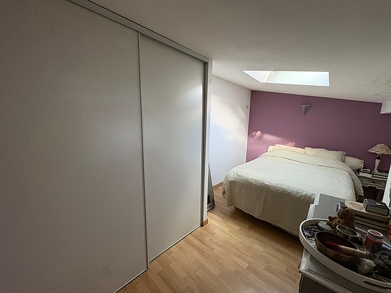 Bedroom with wooden floor