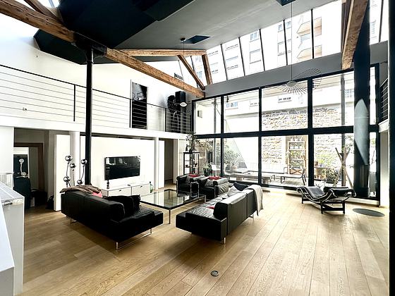 Living room furnished with tv, 1 armchair(s)
