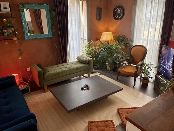 Living room furnished with tv, 1 armchair(s)