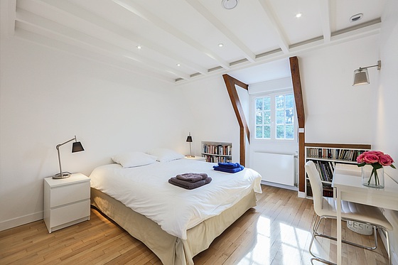 Bedroom with wooden floor