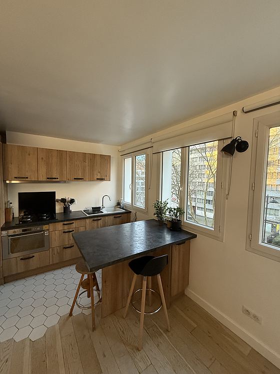 Kitchen where you can have dinner for 2 person(s) equipped with washing machine, refrigerator, extractor hood, crockery