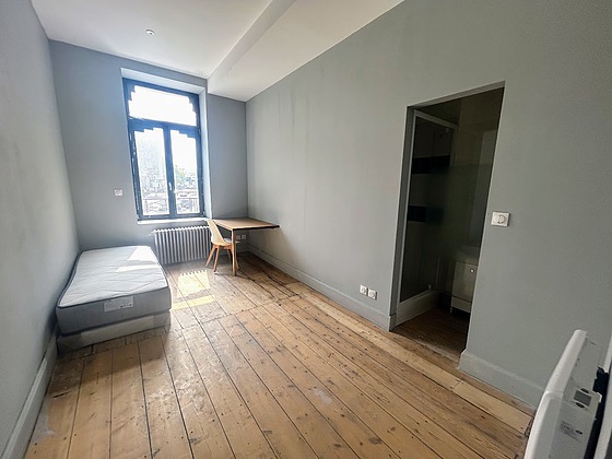 Bedroom with wooden floor