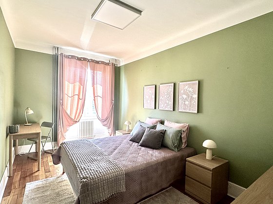 Bedroom with wooden floor