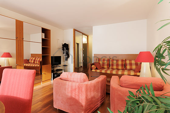 Very bright living room furnished with 2 armchair(s), 4 chair(s)