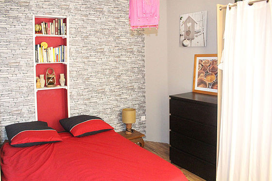 Chambre de 12m² avec du parquet au sol
