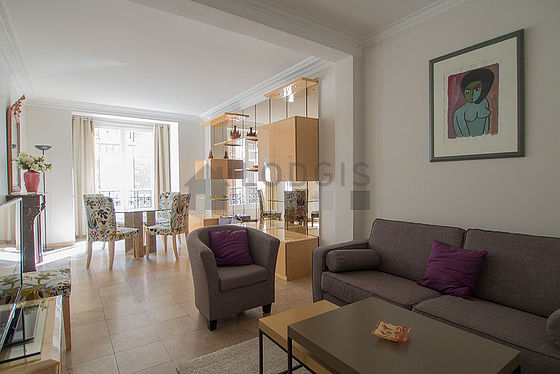 Very quiet living room furnished with tv, 1 armchair(s), 5 chair(s)