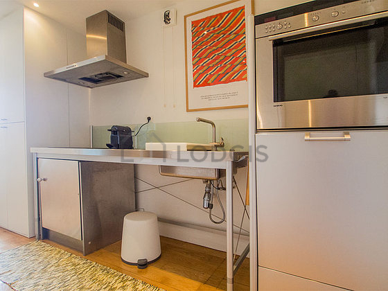 Bright kitchen with windows facing the garden