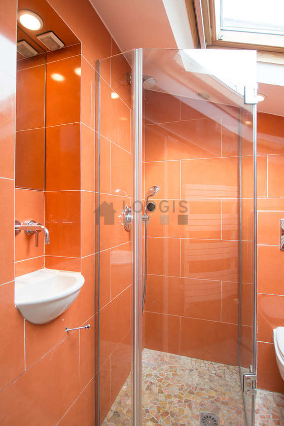 Beautiful and bright bathroom with double-glazed windows and with tile floor