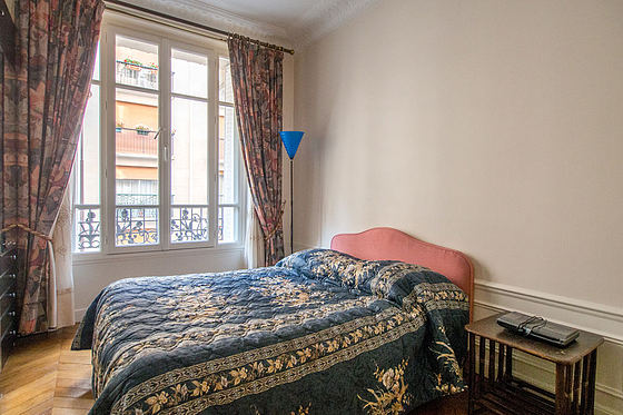 Bedroom with double-glazed windows facing the road