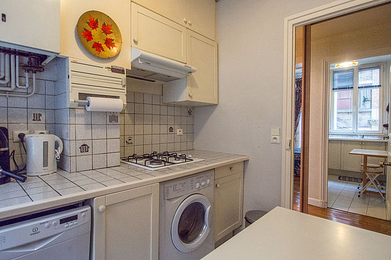 Bright kitchen with windows facing the courtyard
