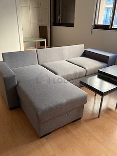 Quiet living room furnished with 1 futon(s) of 140cm, 1 bed(s) of 160cm, tv, wardrobe