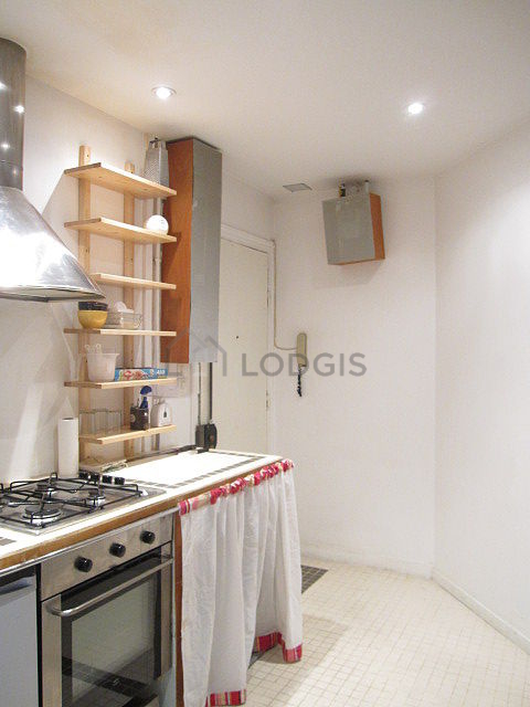 Kitchen equipped with dishwasher, hob, refrigerator, freezer