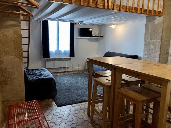 Living room with tile floor
