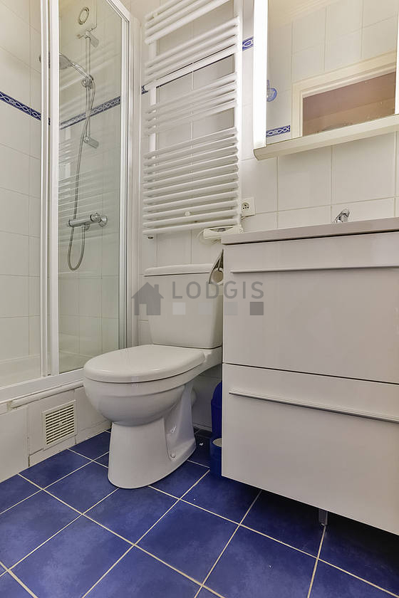 Bathroom equipped with shelves