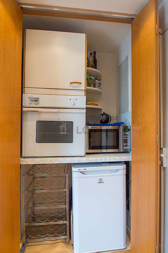 Kitchen equipped with washing machine, dryer, refrigerator, freezer