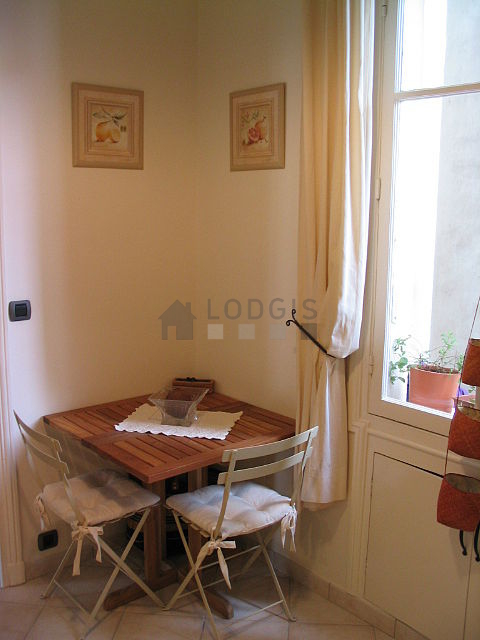 Kitchen with double-glazed windows facing the courtyard