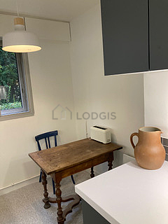 Kitchen where you can have dinner for 4 person(s) equipped with washing machine, refrigerator, crockery, stool