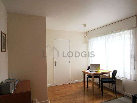 Quiet living room furnished with 1 bed(s) of 140cm, tv, hi-fi stereo, wardrobe