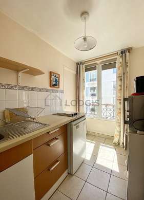 Bright kitchen with windows facing the road