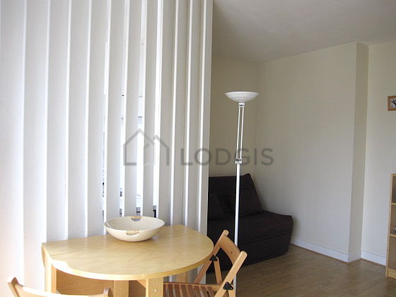 Living room with double-glazed windows facing the road