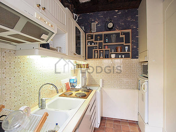 Kitchen where you can have dinner for 3 person(s) equipped with washing machine, refrigerator, freezer, extractor hood