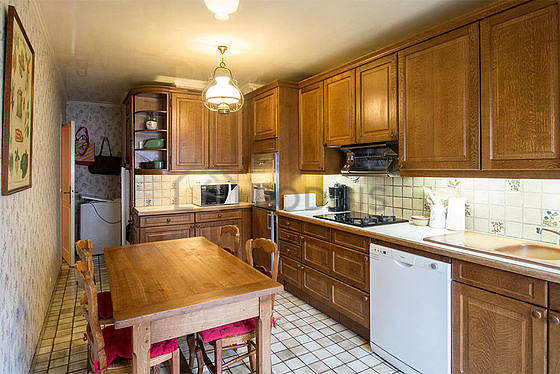 Kitchen where you can have dinner for 4 person(s) equipped with washing machine, dryer, refrigerator, freezer