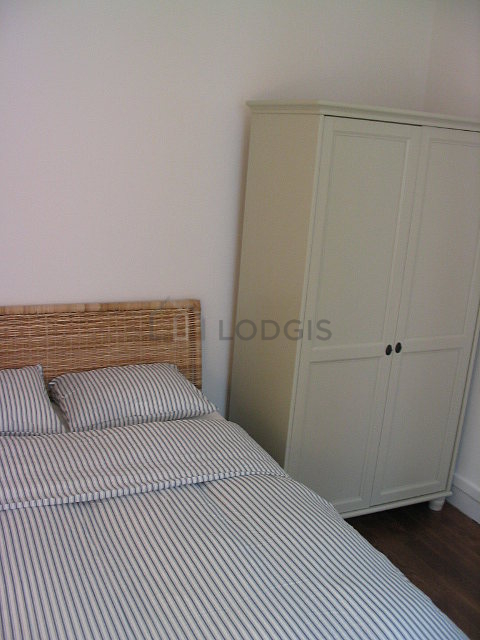 Bedroom with windows facing the courtyard