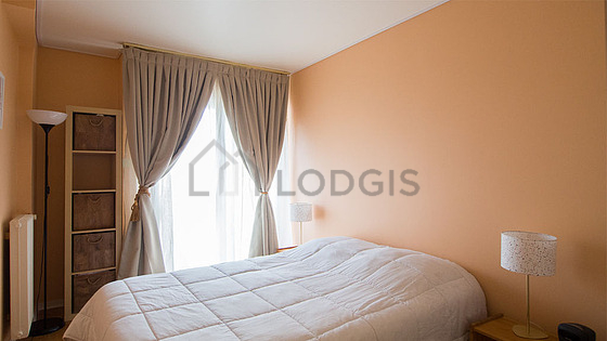 Bedroom with wooden floor