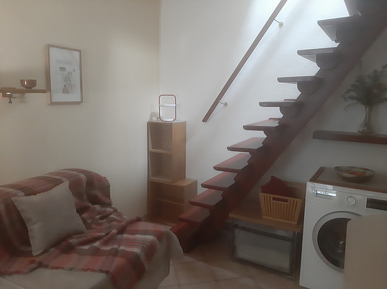 Very quiet living room furnished with sofa, storage space, 2 chair(s)