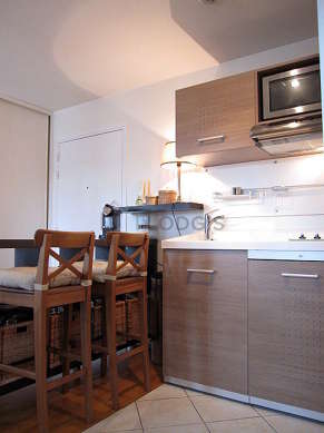 Kitchen where you can have dinner for 2 person(s) equipped with washing machine, refrigerator, freezer, extractor hood
