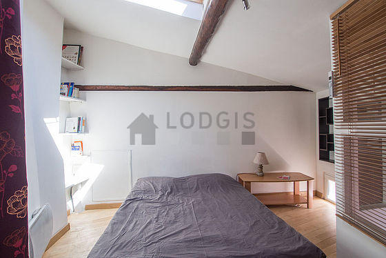 Bedroom with wooden floor