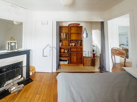 Chambre de 13m² avec du parquet au sol