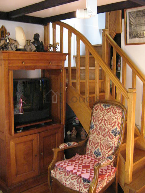 Living room with double-glazed windows facing the courtyard