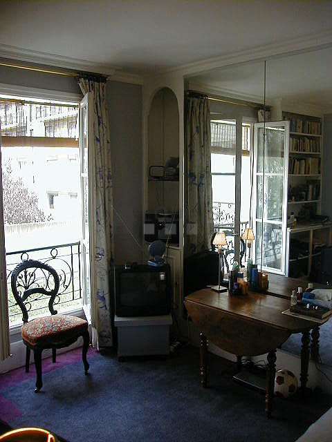 Living room with windows facing the garden