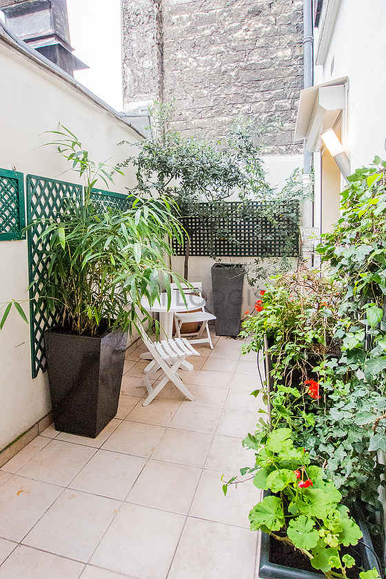 Quiet and bright balcony with paving floor