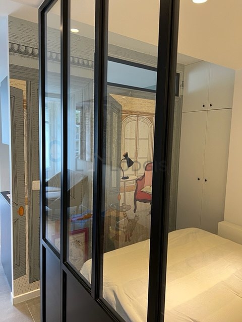 Bedroom with windows