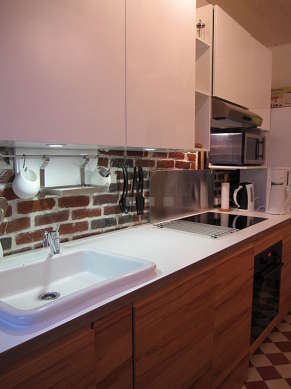 Kitchen where you can have dinner for 4 person(s) equipped with washing machine, dryer, refrigerator, extractor hood
